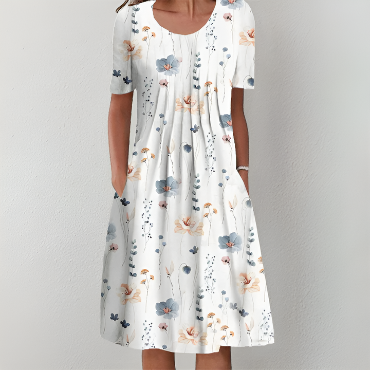 RUBY – FLOWING FLORAL DRESS WITH FLATTERING TUMMY COVERAGE