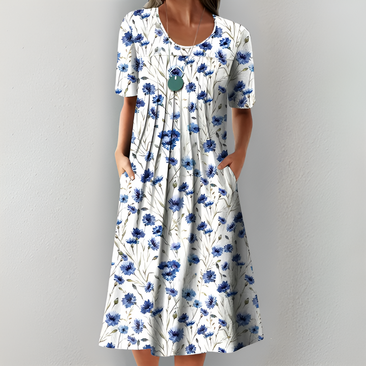RUBY – FLOWING FLORAL DRESS WITH FLATTERING TUMMY COVERAGE