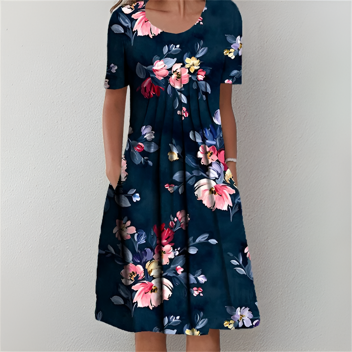 RUBY – FLOWING FLORAL DRESS WITH FLATTERING TUMMY COVERAGE